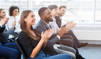 Poster - Business seminar. Colleagues clapping hands in office