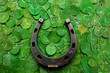 horse shoe on green clovers background. St. Patrick's day