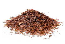 Heap Of Rooibos Tea On White Background. Close Up. High Resolution