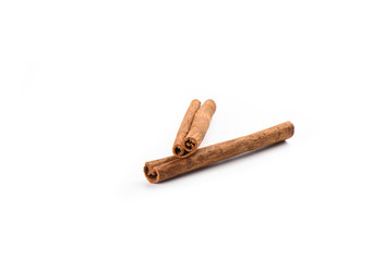 Two cinnamon sticks isolated on white background. Spice concept.