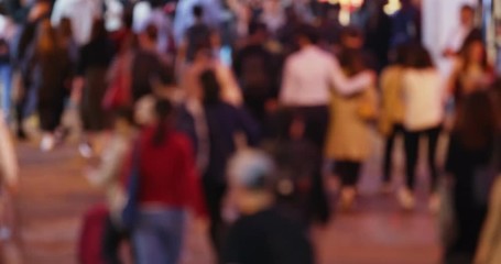 Wall Mural - Blur view of People cross the road at night