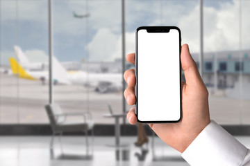 pov hand holding blank smart phone, business travel, advertisement template