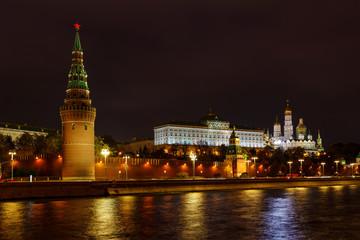 Wall Mural - View of towers of Moscow Kremlin and Grand Kremlin Palace with cathedrals at night with illumination