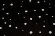© Oleg - white dots on black background