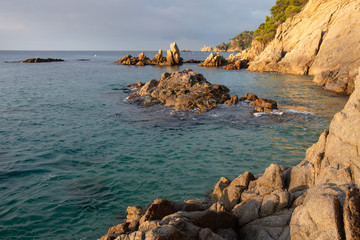 Sticker - Spain, Costa Brava seascape. Sea morning landscape with cliffs and rocks in water near beach