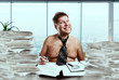 © Nomad_Soul - Crazy businessman in tie on the naked body