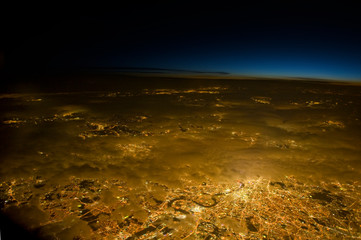 Wall Mural - london from the air at night. street lights below, stars above.
