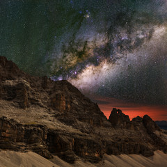 Wall Mural - milky way over the mountains. the dolomites in modonna di campiglio, italy.