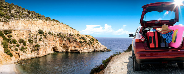 Summer car on road and sea landscape 