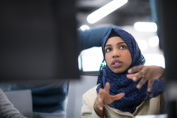 Poster - black muslim female software developer at work