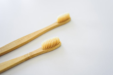 Two wooden toothbrushes