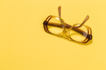 Wall Mural - Old glasses on yellow