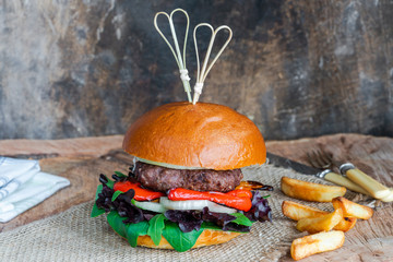 Sticker - Venison burger in brioche bun with peppery leaf salad, onion and roast peppers