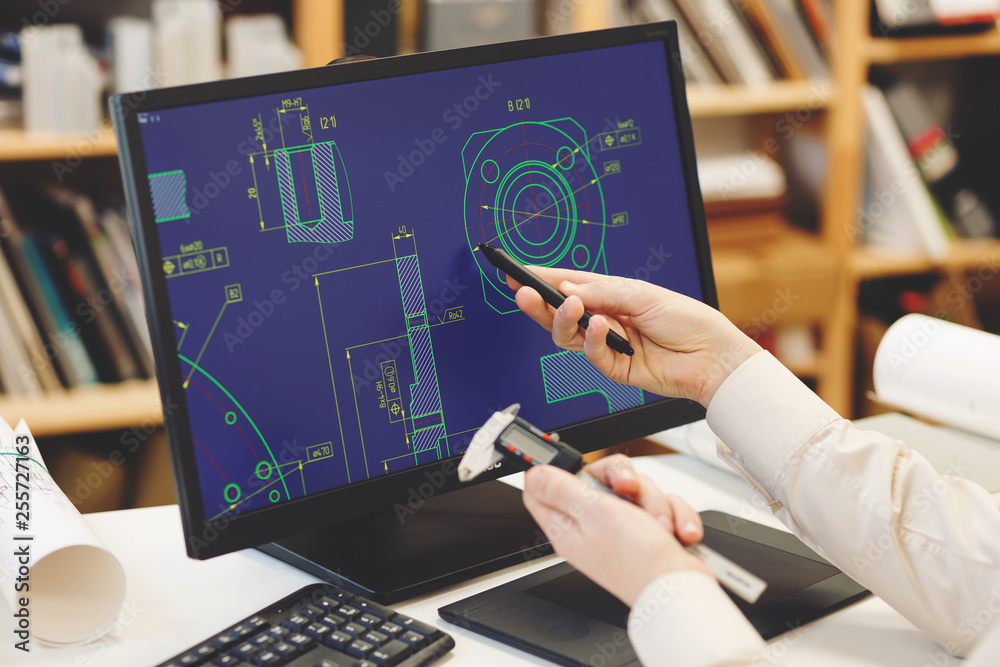 Engineer working on cad scheme using computer tools. - obrazy, fototapety, plakaty 