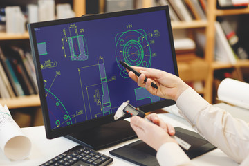 Fototapete - Engineer working on cad scheme using computer tools.