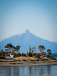Quellon channel in Chiloé island, chile. With the andes range and Corcovado volcano