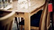 varnish for processing furniture made of wood. table and chairs from solid oak.