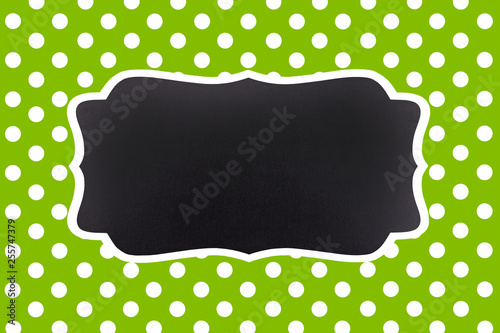Green, greenery background with symmetrical white polka dots and an empty cha...