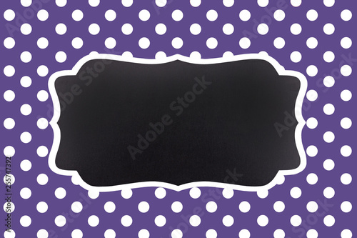 classic ultra violet background with symmetrical white polka dots and an empt...