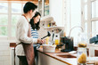© whyframeshot - Attractive Asian couple marry family  preparing cooking food dinner together with happiness and freshful in home kitchen family ideas concept