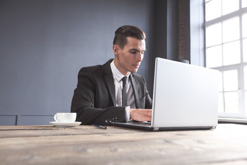 Businessman using laptop