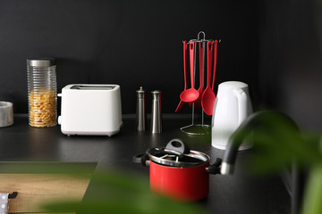 Poster - Stylish kitchen counter with houseware and appliances