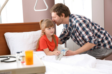 Wall Mural - Man visiting his little child in hospital