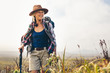 © Jacob Lund - Cheerful senior woman enjoying her hiking trip