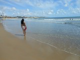 Fototapeta Konie - Woman in the beach