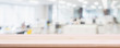 Leinwandbild Motiv Empty wood table top and blur glass window wall in office building background - can used for display or montage your products.