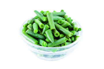 Wall Mural - Green beans on the plate  isolated on white background