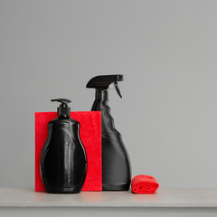 Red and black set of tools and tools for cleaning the kitchen. Neutral background.Copy space.