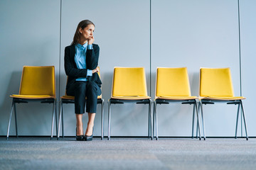 Stressful businesswoman waiting for job interview