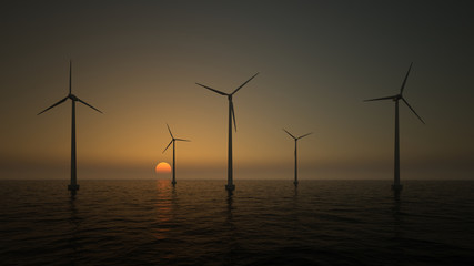 Wind turbines on the rising sun background 