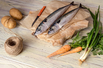 Mackerel and vegetables on the table