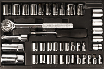 Tool box, set of wrenches and bits. Top view of this tools kit.