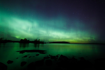 Wall Mural - beautiful northern lights over lake