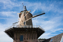 Mill Called "Rijn And Lek-, Wijk Bij Duurstede, The Netherlands. Against Blue Sky