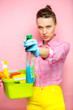 © Leart - Woman with house supplies ready to to clean room. Spring cleaning