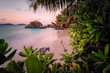 Paradise exotic beach on La Digue Island, Seychelles. Long Exposure during amazing sunset