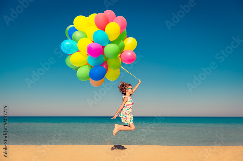 Child enjoys a summer vacation at the sea