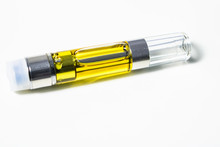 Cannabis Distillate Plus Terpenes In Vaporizor Cartridge For Smoking The Cannabinoids Extracted From Marijuana Plants For Medicinal Use. Isolated On White Background