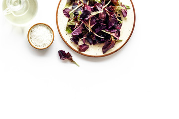 green and red salad mix for healthy food on white background top view mock up