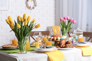 Festive Easter table setting with traditional meal at home