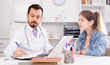 © JackF - Doctor and girl with sore throat