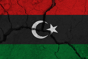 Wall Mural - libya flag on the cracked earth