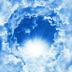 religion concept of heavenly background. divine shining heaven with dramatic clouds, light. sky with