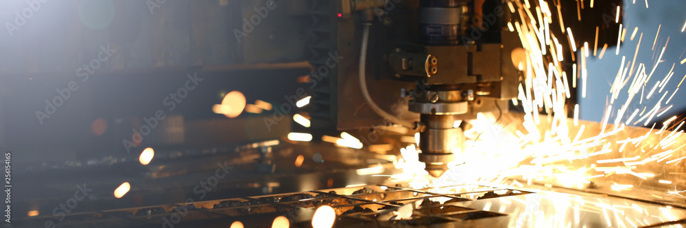 Sparks fly out machine head for metal processing - obrazy, fototapety, plakaty 