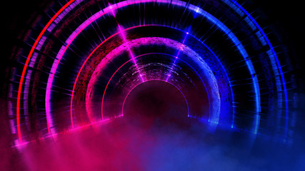 Background of an empty dark room with a concrete floor, multicolored neon circles in the center, neon light and multi-colored smoke.  Night view, round tunnel, corridor. Abstract light.