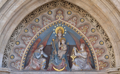  Virgin Mary with baby Jesus and Angels, statue from portal of the church of St. Matthew near the fisherman bastion in Budapest, Hungary
